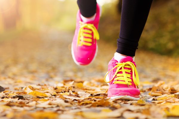 Women's feet in pink trainers