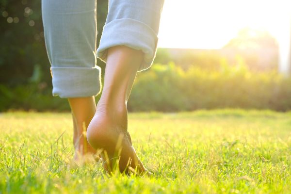 Woman walking barefoot