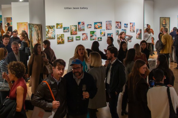 People viewing in art gallery