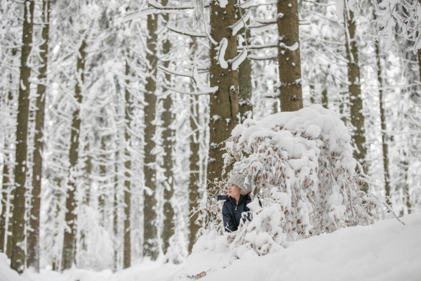 Child in snowy Austrian forest